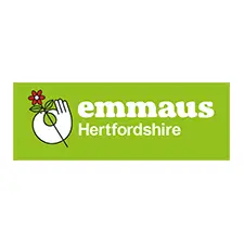 Emmaus Hertfordshire logo with a green background, white text, and an illustration of a hand holding a red flower.