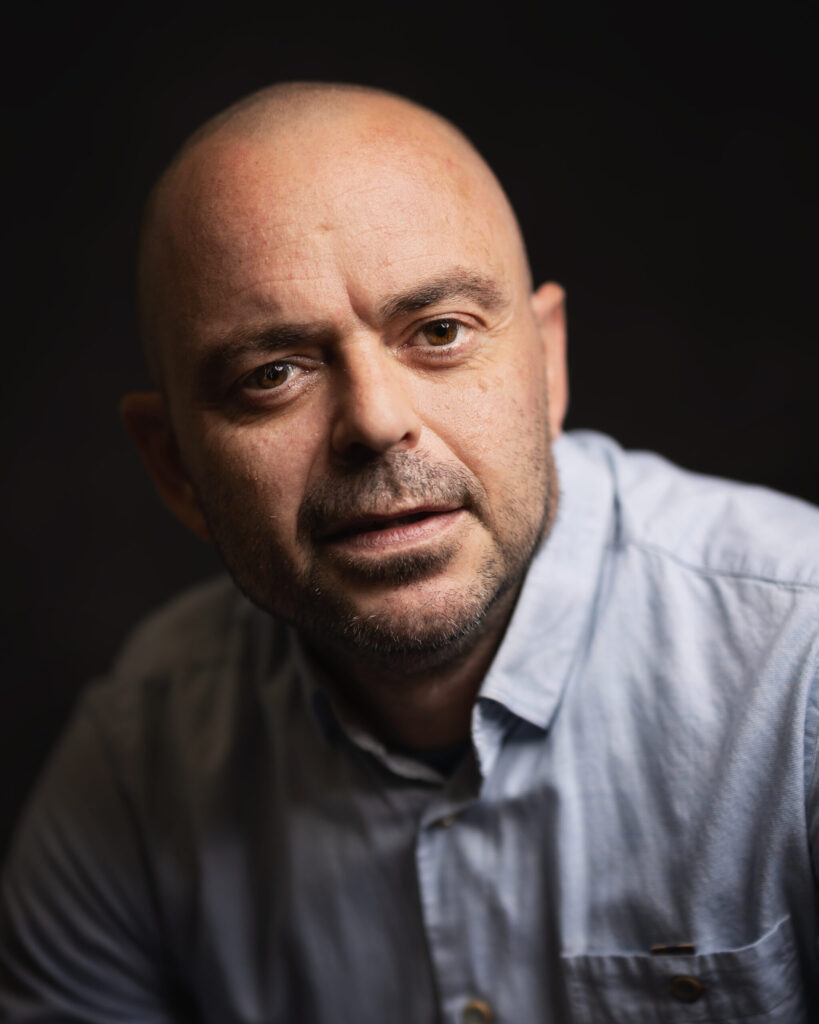 Portrait photographer Christopher Hall looking directly at the camera